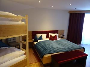 Postel nebo postele na pokoji v ubytování Hotel Restaurant Rosengarten