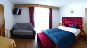 Postel nebo postele na pokoji v ubytování Hotel Restaurant Rosengarten