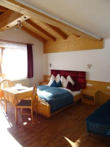 Postel nebo postele na pokoji v ubytování Hotel Restaurant Rosengarten