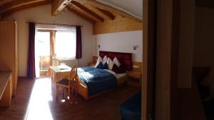 Postel nebo postele na pokoji v ubytování Hotel Restaurant Rosengarten