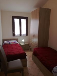 A bed or beds in a room at Apartment Altomare