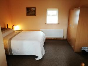 Letto o letti in una camera di Danubio Guest Accommodation