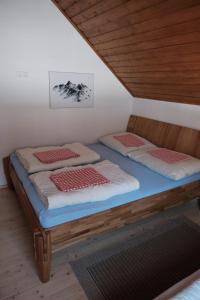 Letto o letti in una camera di Seebachhaus
