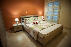 En eller flere senge i et værelse på La Casa Di Linda