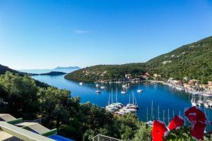 a view of a harbor with boats in the water at Ktima Aniforeli Luxury Villas in Sivota