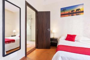 Posteľ alebo postele v izbe v ubytovaní Roma Enrico Guesthouse