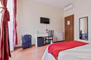 Posteľ alebo postele v izbe v ubytovaní Roma Enrico Guesthouse
