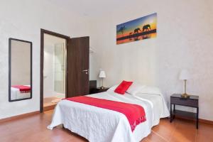 Posteľ alebo postele v izbe v ubytovaní Roma Enrico Guesthouse
