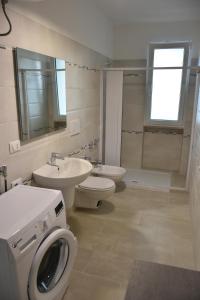 Ванна кімната в Casa mare Torre Pali Salento