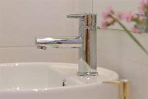 Ванная комната в Apartamento con vistas al mar +35 фотографий