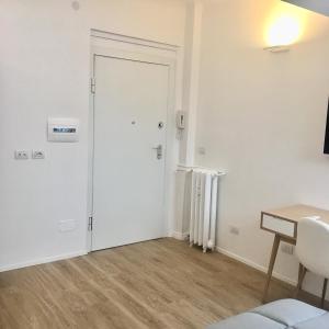 A bed or beds in a room at CORSO VENEZIA APARTMENT