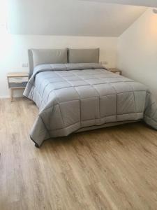 A bed or beds in a room at CORSO VENEZIA APARTMENT