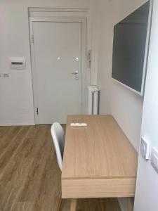 A television and/or entertainment centre at CORSO VENEZIA APARTMENT
