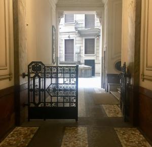 A bed or beds in a room at CORSO VENEZIA APARTMENT