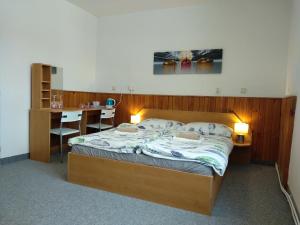 Posteľ alebo postele v izbe v ubytovaní Prázdninový dům Na Panorámě