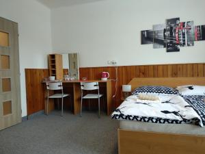 Posteľ alebo postele v izbe v ubytovaní Prázdninový dům Na Panorámě