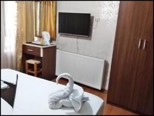 Postel nebo postele na pokoji v ubytování Istanbul Sydney Hotel