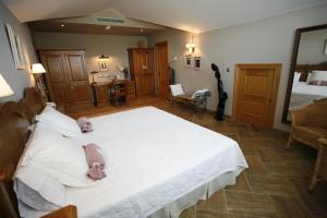 Postel nebo postele na pokoji v ubytování Hotel Katxi