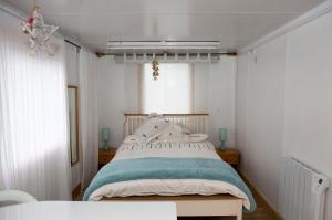a bedroom with a bed and a window at Room with a view in Spean Bridge