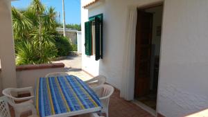 A balcony or terrace at Villini Giovanna Disanti