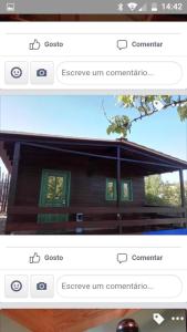 uno screenshot di un sito web con una foto di una casa di CABANA DO SOL a Torres Vedras