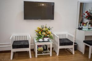 TV a/nebo společenská místnost v ubytování Lieber Hotel