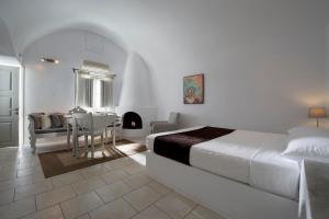 Postel nebo postele na pokoji v ubytování Gorgona Villas + 19 fotografií