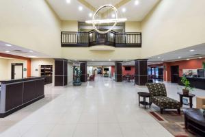 a lobby of a hospital with a waiting room at Wingate by Wyndham Lake Charles Casino Area in Lake Charles