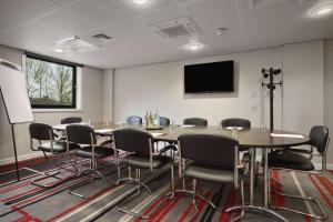 TV a/nebo společenská místnost v ubytování Ramada Encore Newcastle-Gateshead