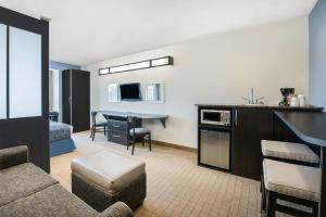 A television and/or entertainment center at Microtel Inn & Suites by Wyndham Stanley