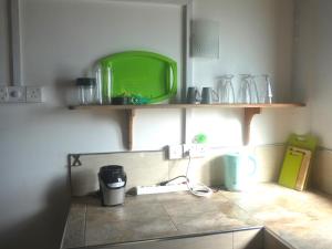Kuchyň nebo kuchyňský kout v ubytování Sunshine Cafe