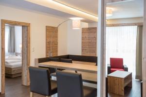 Łóżko lub łóżka w pokoju w obiekcie A Casa Saphir Appartement-Hotel