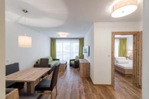 Łóżko lub łóżka w pokoju w obiekcie A Casa Saphir Appartement-Hotel