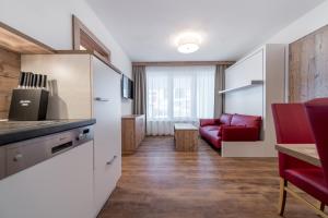Kuchnia lub aneks kuchenny w obiekcie A Casa Saphir Appartement-Hotel