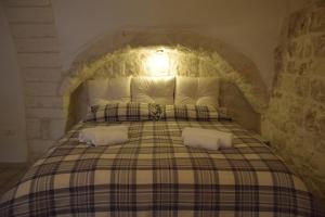 Postel nebo postele na pokoji v ubytování Dimora Levante