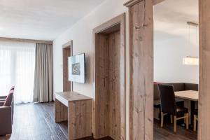 Telewizja i/lub zestaw kina domowego w obiekcie A Casa Saphir Appartement-Hotel