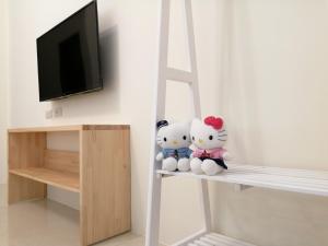 Televiisor ja/või meelelahutuskeskus majutusasutuses 日月山水民宿 台東縣民宿1495號 +62 fotot