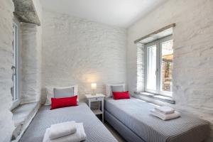 Posteľ alebo postele v izbe v ubytovaní Xyla Beach Studios