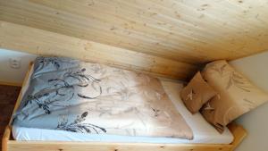 Postel nebo postele na pokoji v ubytování Rychlebská Pohoda