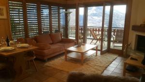 Istumisnurk majutusasutuses Appartement d'une chambre avec vue imprenable - Veysonnaz