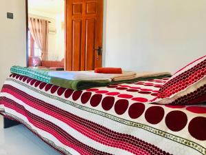 Postel nebo postele na pokoji v ubytování Loversleap bungalow