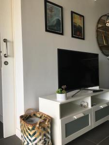 A television and/or entertainment centre at Beach Life