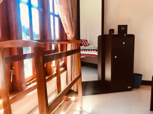 Postel nebo postele na pokoji v ubytování Loversleap bungalow