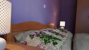Postel nebo postele na pokoji v ubytování Barbara