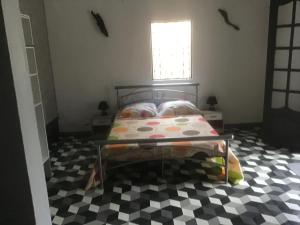 Cama o camas de una habitación en Résidence MATHO - NONNi