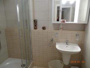 Kúpeľňa v ubytovaní GaleriusBeach Deluxe Apartment + 14 fotografií