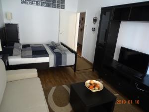 Posteľ alebo postele v izbe v ubytovaní GaleriusBeach Deluxe Apartment