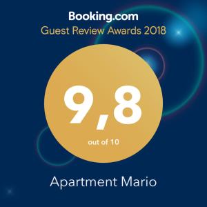 a sign that says quest review awards with a yellow circle at Apartment Mario in Split