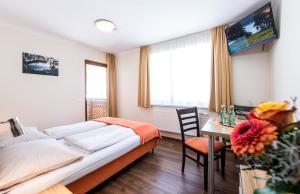 Voodi või voodid majutusasutuse Pension Appartements Kirchenwirt toas