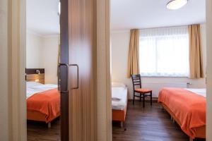 Voodi või voodid majutusasutuse Pension Appartements Kirchenwirt toas